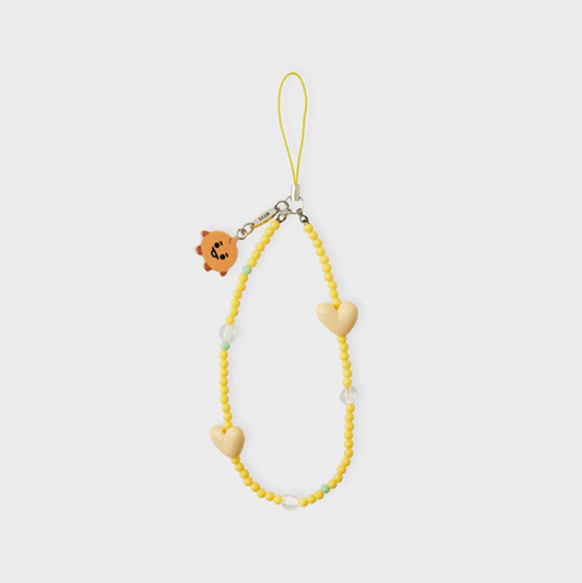 yellow phone strap with bt21 shooky face and beige heart front