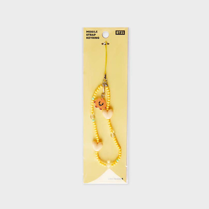 yellow phone strap with bt21 shooky face and beige heart package